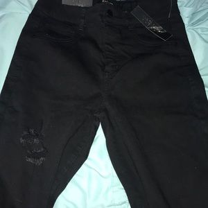Ripped black skinny jeans size 8